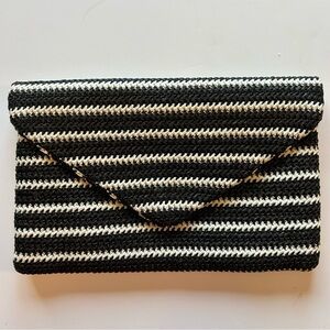 Chic Black and White Striped Straw Clutch with Gold Chain Shoulder Strap